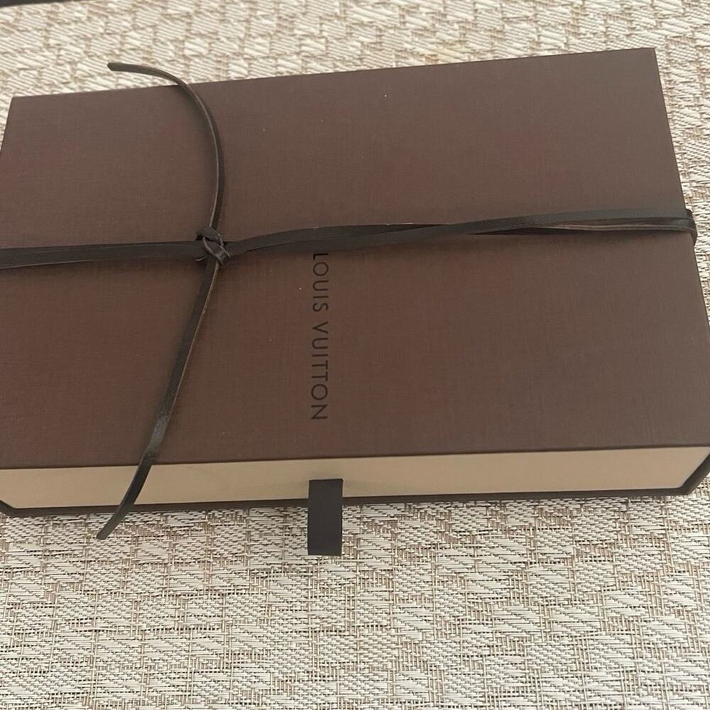 Louis Vuitton brown box with leather tie + dustbag